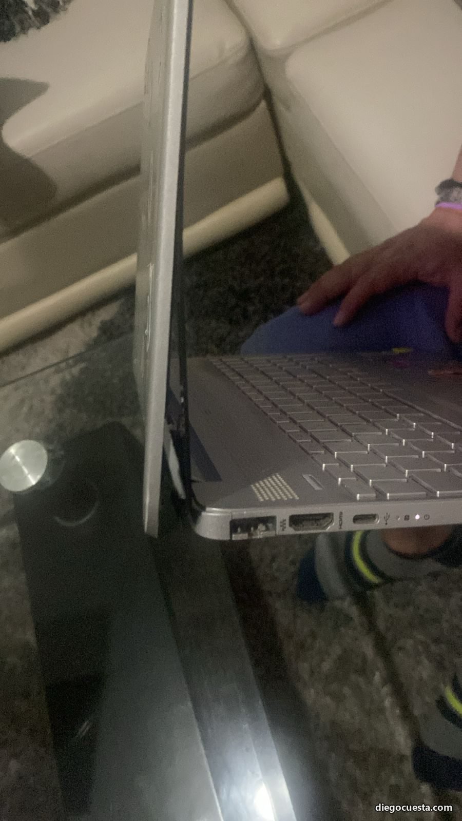 Laptop used on a soft surface with forced opening